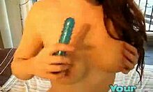 Latin beauty receives a blue toy for her self pleasure press in the shower